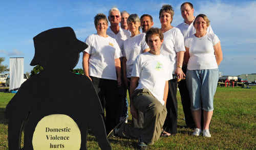 The White Ribbon gathering at the Jetty foreshores on Thursday evening. One of the ambassadors, Advocate GM Craig Frost, is pictured at right in the back row. The White Ribbon gathering at the Jetty foreshores on Thursday evening. One of the ambassadors, Advocate GM Craig Frost, is pictured at right in the back row.